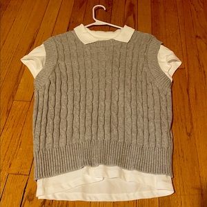 2 Items in one. Grey Sweater Vest With A White Polo.